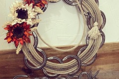 Wreath with Horseshoes, last name